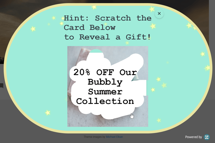 Popup with text: Hint: Scratch the Card Below to Reveal a Gift! Below: a scratched card with the text 20% Off Our Bubbly Summer Collection.